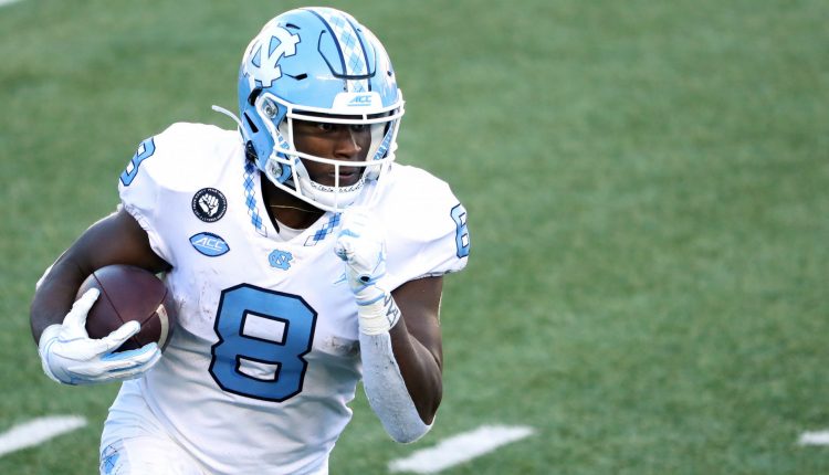 Michael Carter and Javonte Williams jointly set the NCAA rushing record at the UNC blowout in Miami

