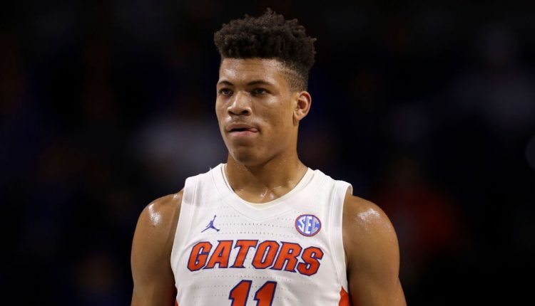 Keyontae Johnson receives congratulations from second graders

