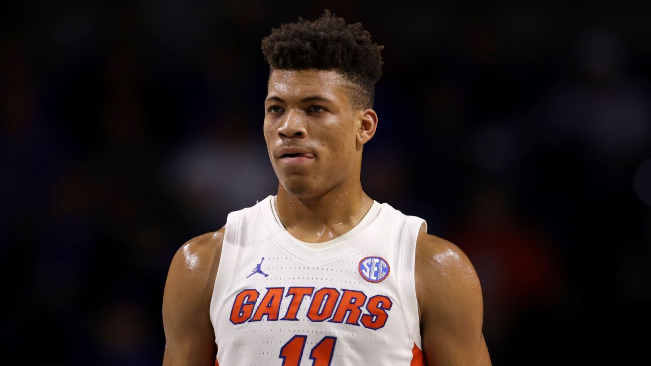 Keyontae Johnson receives congratulations from second graders