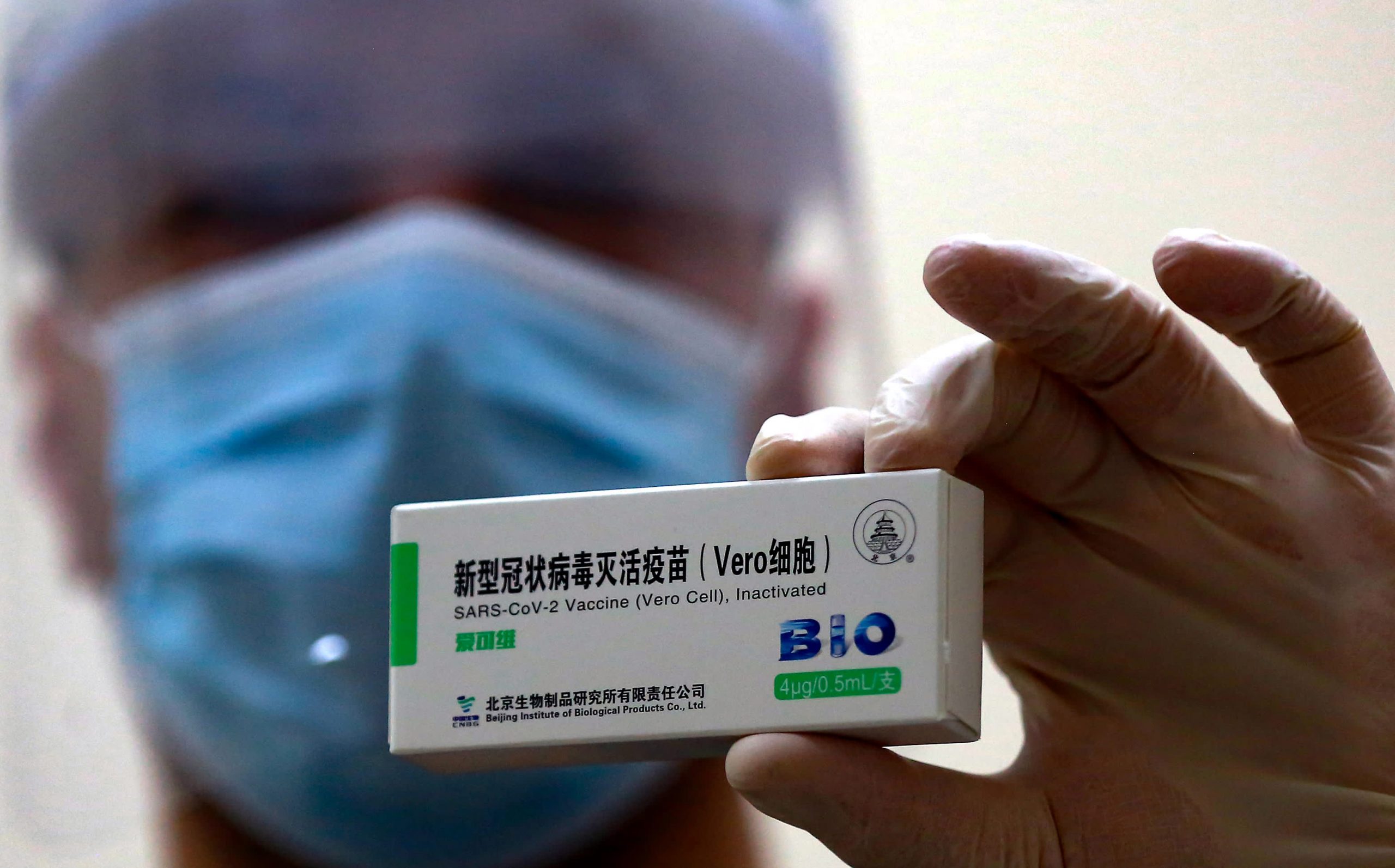 Chinese vaccine maker Sinopharm says the chairman and a director have resigned