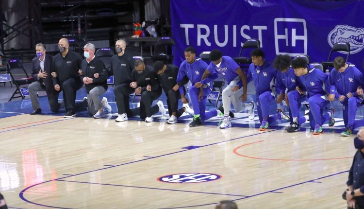 Kentucky backs up men's basketball player John Calipari kneeling amid local setbacks

