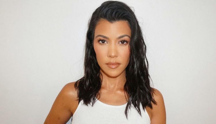 Kourtney Kardashian is spotted with Travis Barker as dating rumors continue to swirl

