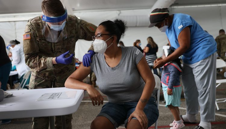 Covid cases are rising in 21 states as health officials warn against reopening too soon

