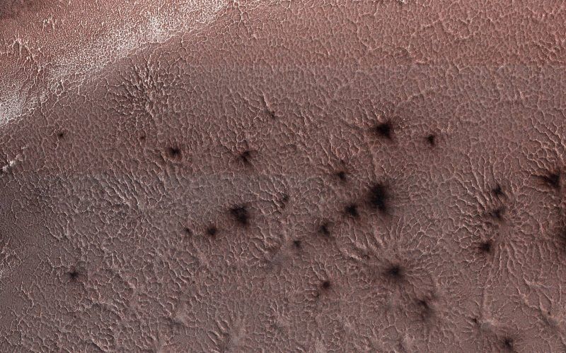 Mars spiders form as spring arrives on Mars.  But why?