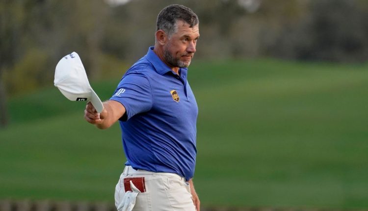 Lee Westwood leads the Players Championship by 2 points when another showdown with Bryson DeChambeau is due

