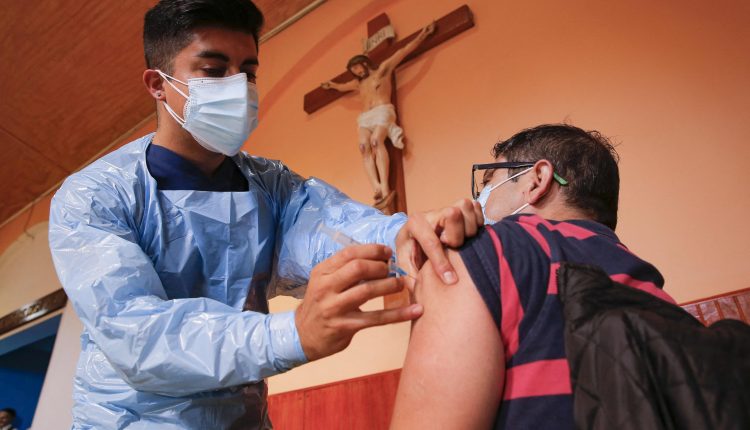 Chile's coronavirus cases hit record levels despite vaccine introduction

