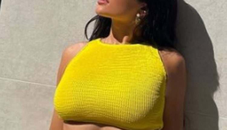 Kylie Jenner proves that spring has started with rattling drops in a yellow bikini

