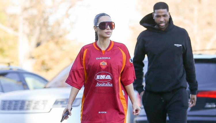 Kim K slams paparazzi asking if Kanye West threw a phone

