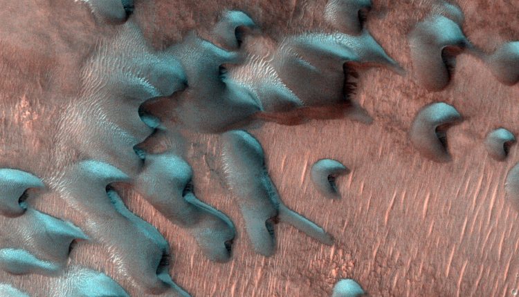 Seen from space: sand dunes on Mars covered by frost

