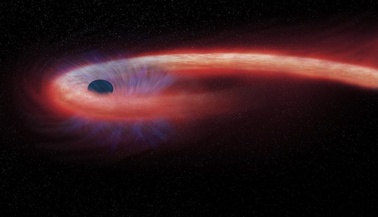 This artist's illustration depicts what astronomers call a "tidal disruption event," or TDE, when an object such as a star wanders too close to a black hole and is destroyed by tidal forces generated from the black hole's intense gravitational forces. (Credit: NASA/CXC/M.Weiss.