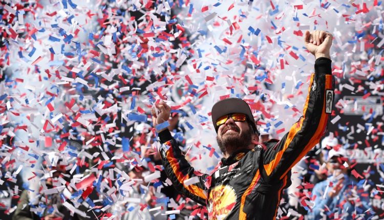 Martin Truex Jr. wins the NASCAR race at Dover for the third time


