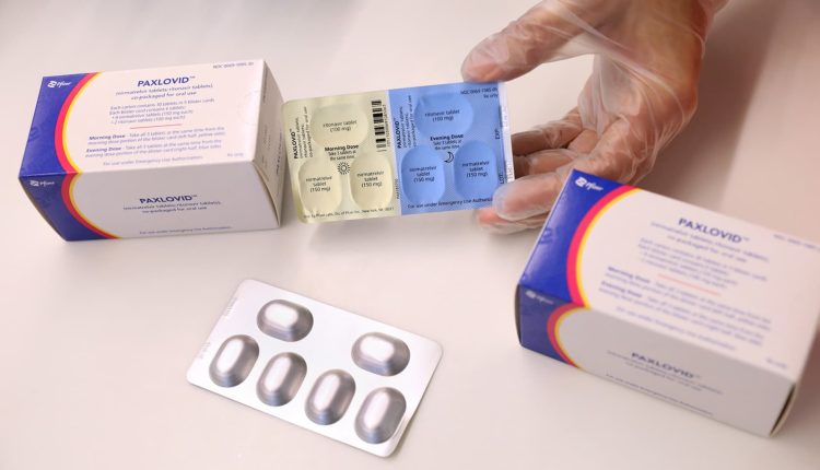 Pfizer employee insiders acted ahead of Covid pill data, DOJ and SEC say

