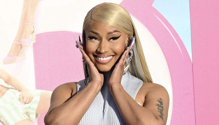 Fans are outraged that Nicki Minaj is cutting off her 'Barbie' premiere wig


