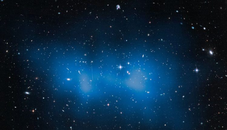 Hubble Space Telescope image of the El Gordo galaxy cluster. This and other gigantic galaxy clusters are challenging the most common theory of the evolution of structure in the Universe. Credit: NASA, ESA, and J. Jee (University of California, Davis)