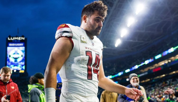 Washington Commanders QB Sam Howell shrugging off the hits