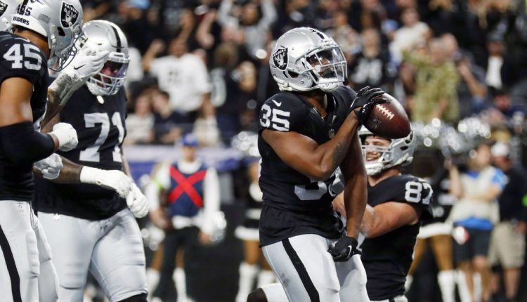 Raiders hang team-record 63 points on banged-up Chargers