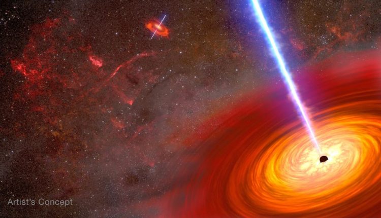 An artist's concept of what two merging supermassive black holes might look like. Each one is surrounded by an accretion disk of hot gas and material streaming away via jets. CourtesyNASA, ESA, Joseph Olmsted (STScI)
