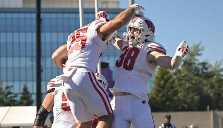 Wisconsin strength and conditioning coach dives into lake after Northwestern win

