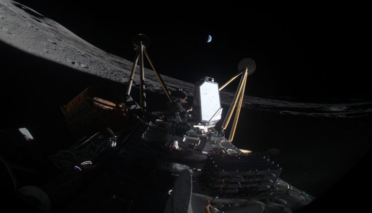 Image of the IM-2 mission laying on its side in a lunar crater with Earth in the distance.Credit: Intuitive Machines