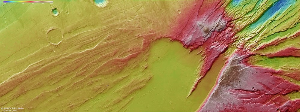 This colour-coded topographic image of Mars shows the Acheron Fossae region of Mars. It was captured by the Mars Express spacecraft (Credit : ESA/DLR/FU Berlin)